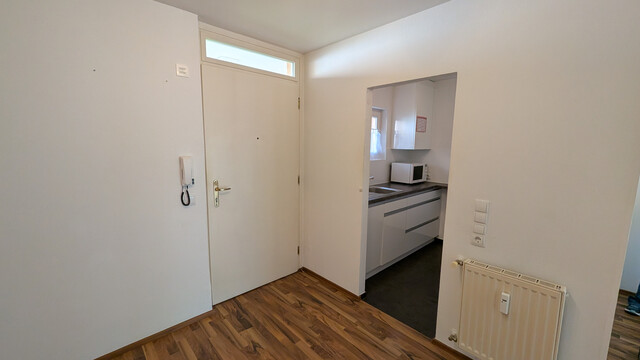 2-Zimmer-Wohnung mit Wintergarten und Tiefgaragenplatz in ruhiger Lage