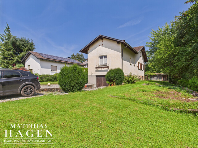 Grundstück mit Altbestand in toller Wohnlage