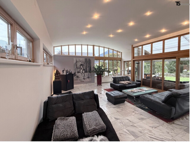 Nüziders: Einfamilienhaus mit Garten - Premium-Immobilie – Wohnjuwel mit Wintergarten, Wellnessbereich & Traumgarten