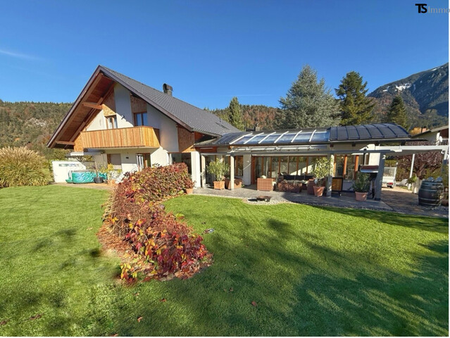 Nüziders: Einfamilienhaus mit Garten - Premium-Immobilie – Wohnjuwel mit Wintergarten, Wellnessbereich & Traumgarten