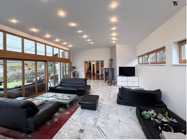 Nüziders: Einfamilienhaus mit Garten - Premium-Immobilie – Wohnjuwel mit Wintergarten, Wellnessbereich & Traumgarten