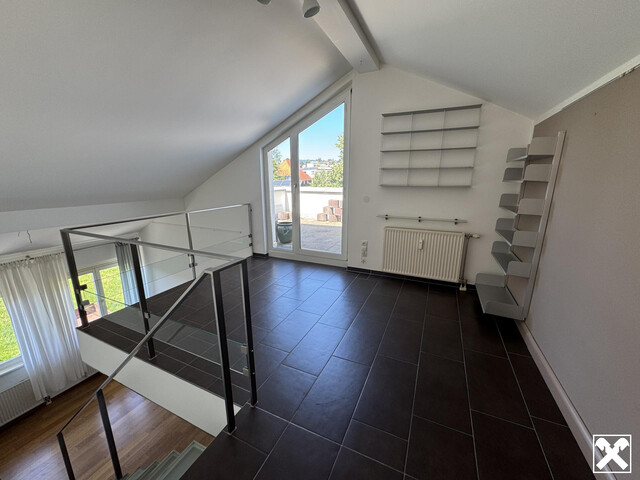 Außergewöhnliche Maisonettewohnung mit Tiefgaragenplatz