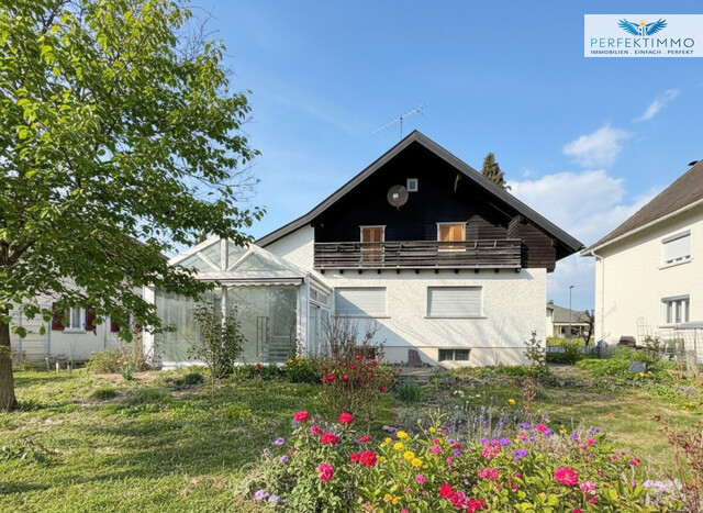 Haus mit großem Garten und Gestaltungspotenzial