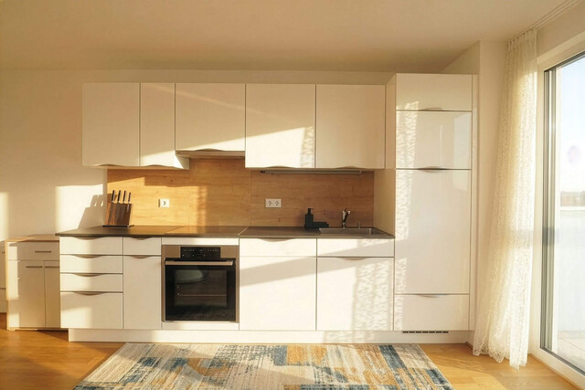 Neuwertige 3-Zimmer-Wohnung in zentraler Grünlage mit Bergpanorama