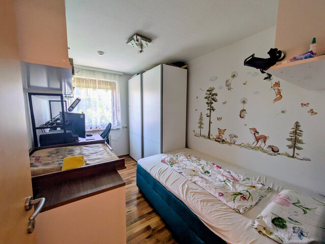 Wohnung mit Garage, Stellplatz und Garten in Top-Lage!