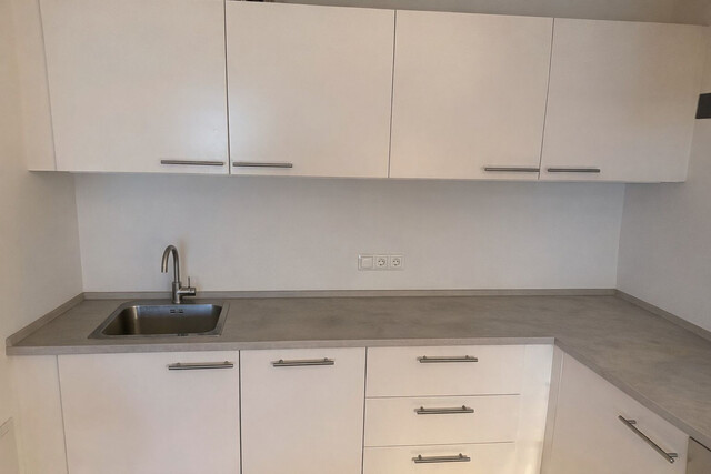 Moderne 2-Zimmer-Wohnung mit Garten - Tiefgaragenplatz mit Wallbox