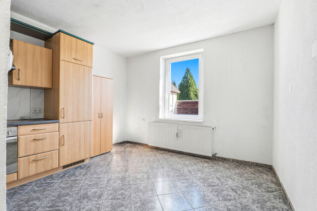 Doppelhaushälfte zum Preis einer Wohnung mit Modernisierungspotential und bereits erfolgten Updates