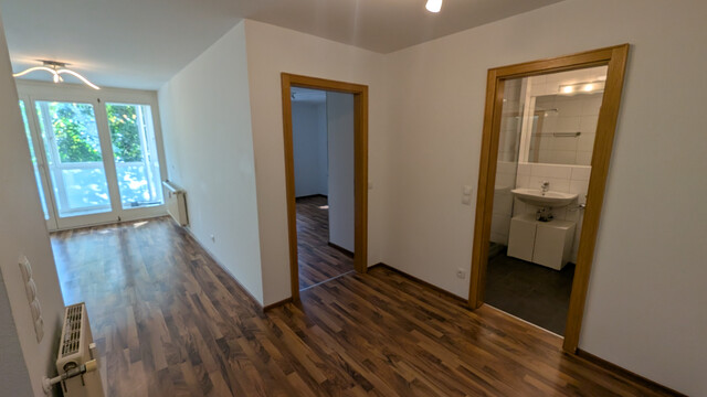 2-Zimmer-Wohnung mit Wintergarten und Tiefgaragenplatz in ruhiger Lage