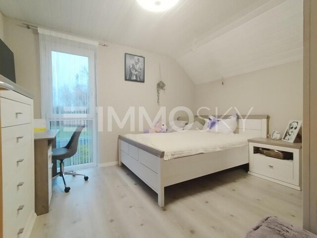 Moderne Doppelhaushälfte mit gepflastertem Außenbereich in Altach