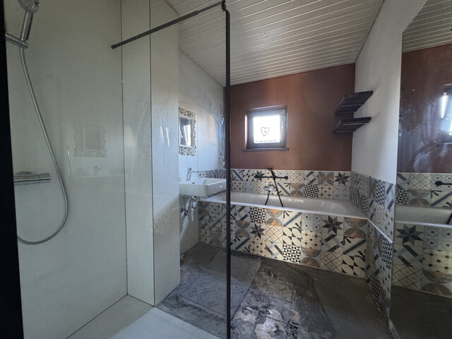 Bungalow mit traumhaftem Wintergarten in ruhiger Wohngegend