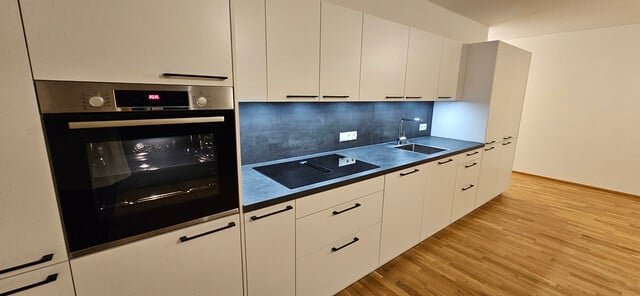 Neuwertige exklusive 3-Zimmer-Wohnung mit Garten im Herzen von Mäder – inkl. Tiefgaragenplatz