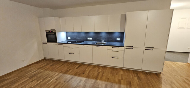 Neuwertige exklusive 3-Zimmer-Wohnung mit Garten im Herzen von Mäder – inkl. Tiefgaragenplatz