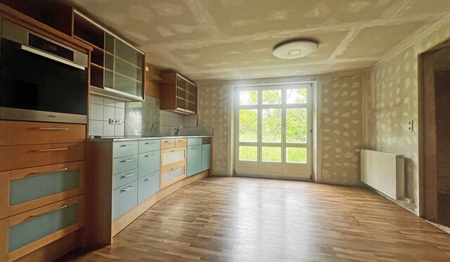 Klassische Holzvilla auf reichlich Umschwung mit großem Entwicklungspotenzial