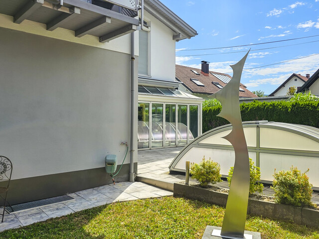 Familientraum in modernisierter Doppelhaushälfte mit Garten, Garage und Westbalkon in Bregenz