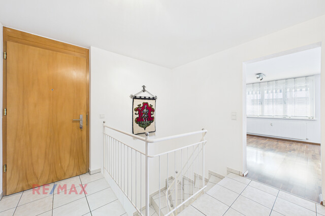 Zwei Etagen, ein Zuhause – Gartenwohnung mit Wohlfühlgarantie und Doppelgarage