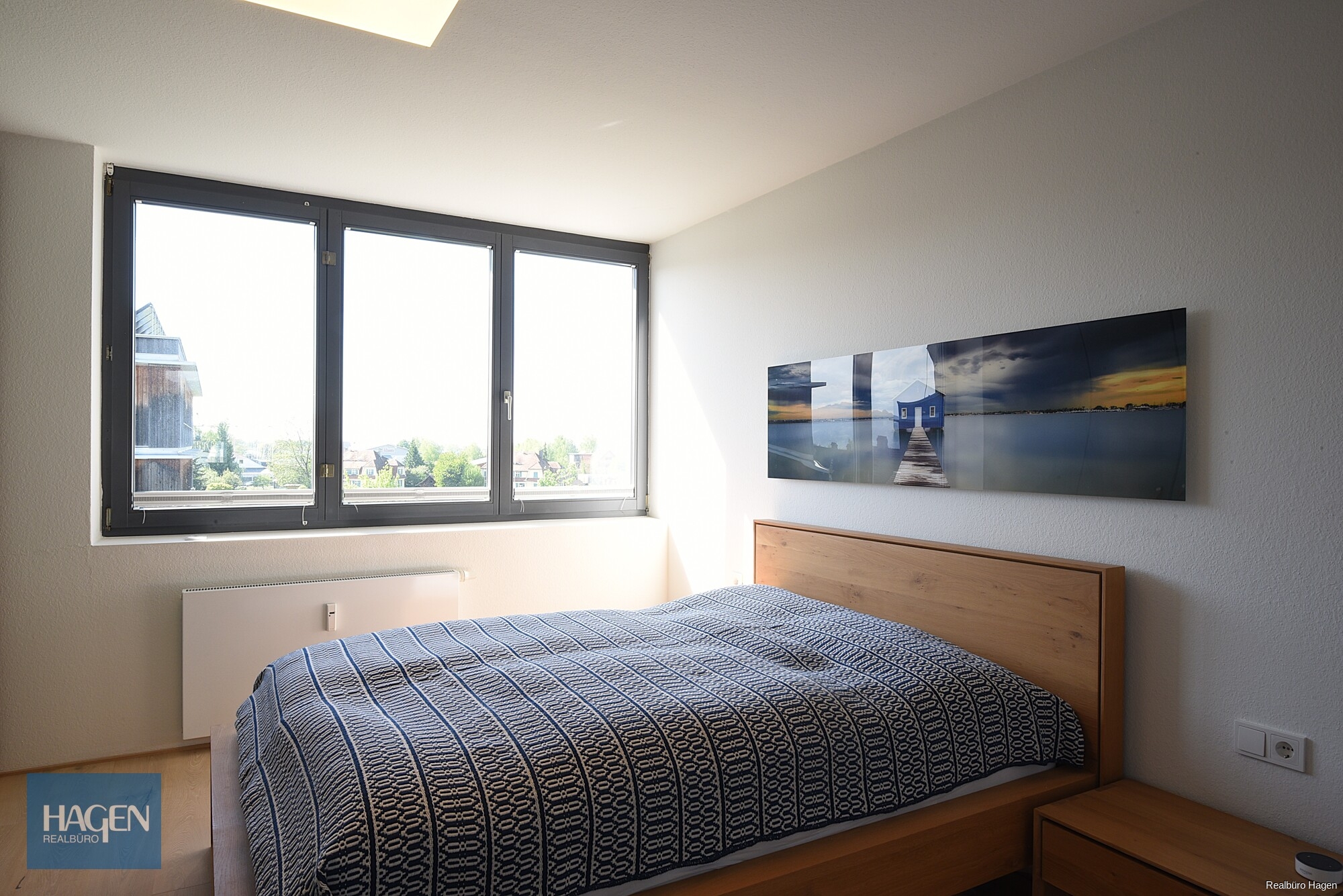 Seenahe Dachgeschossresidenz mit Panorama & Privatsphäre in Hard