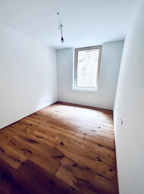 Hochwertige Gartenwohnung in Neubau (2023)