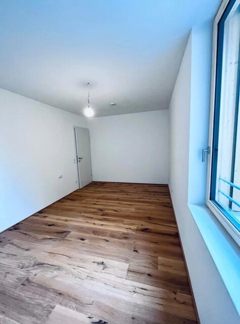 Hochwertige Gartenwohnung in Neubau (2023)