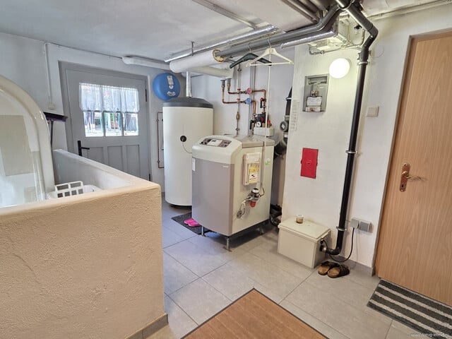 Charmantes Einfamilienhaus mit großzügigem Garten, Garage und verglaster Terrasse in Altach