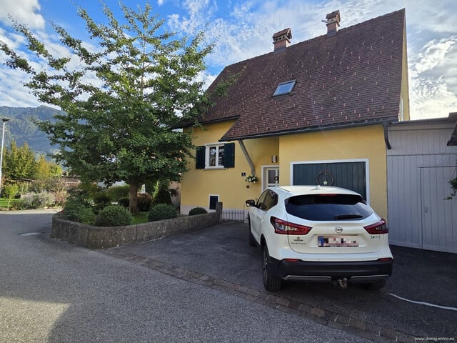 Charmantes Einfamilienhaus mit großzügigem Garten, Garage und verglaster Terrasse in Altach