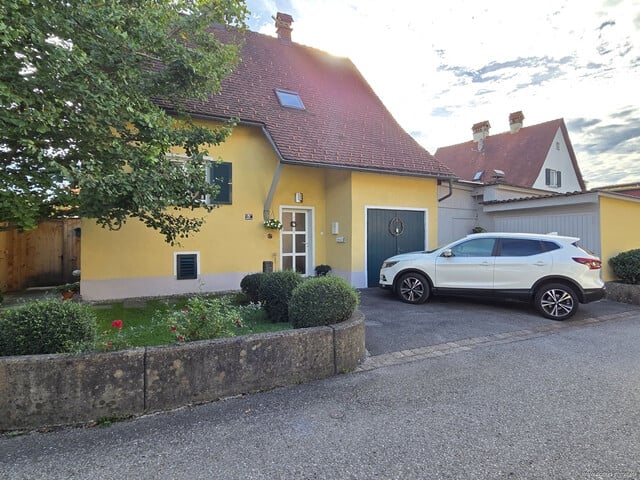 Charmantes Einfamilienhaus mit großzügigem Garten, Garage und verglaster Terrasse in Altach