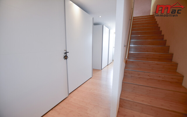 Modernes Einfamilienhaus mit großzügigem Garten und sonniger Dachterrasse