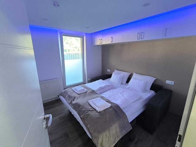 Sanierte Terrassenwohnung mit 18 m² Balkon und Bergpanorama und Bahnhofnähe - Ideal zum Kaufen!