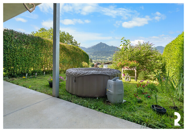 VERMIETETE 2-ZIMMER-GARTENWOHNUNG MIT BERGPANORAMA IN SATTEINS