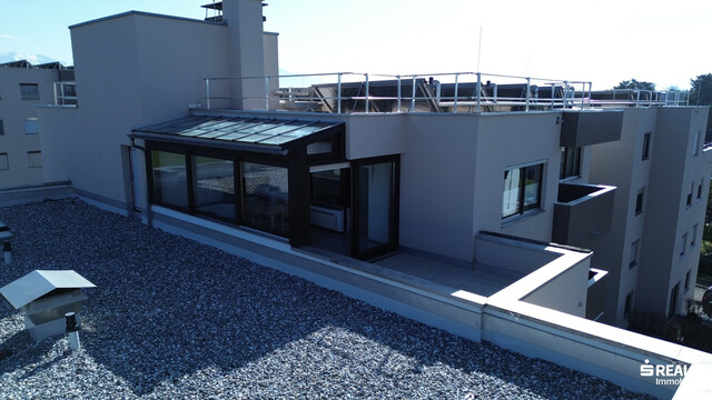 Charmante 3-Zimmer-Dachgeschosswohnung mit großem Wintergarten, Terrasse und Balkon