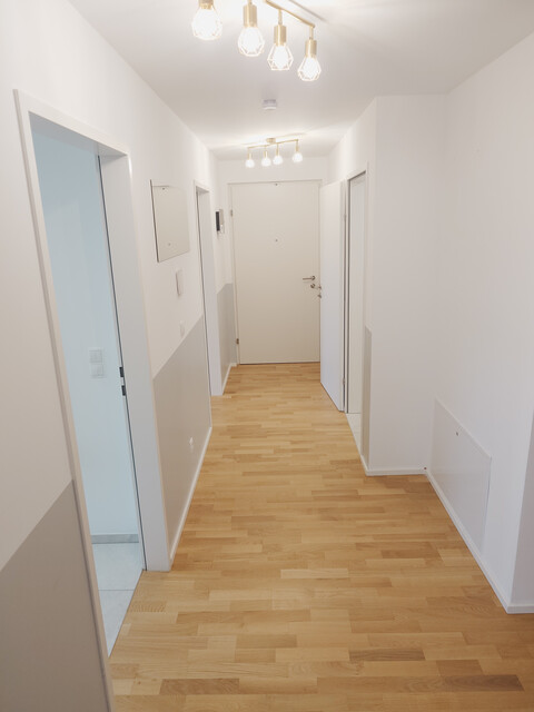 Hochwertige 3- Zimmer Gartenwohnung  mit 2 TG- Plätzen als Erstbezug zu vermieten